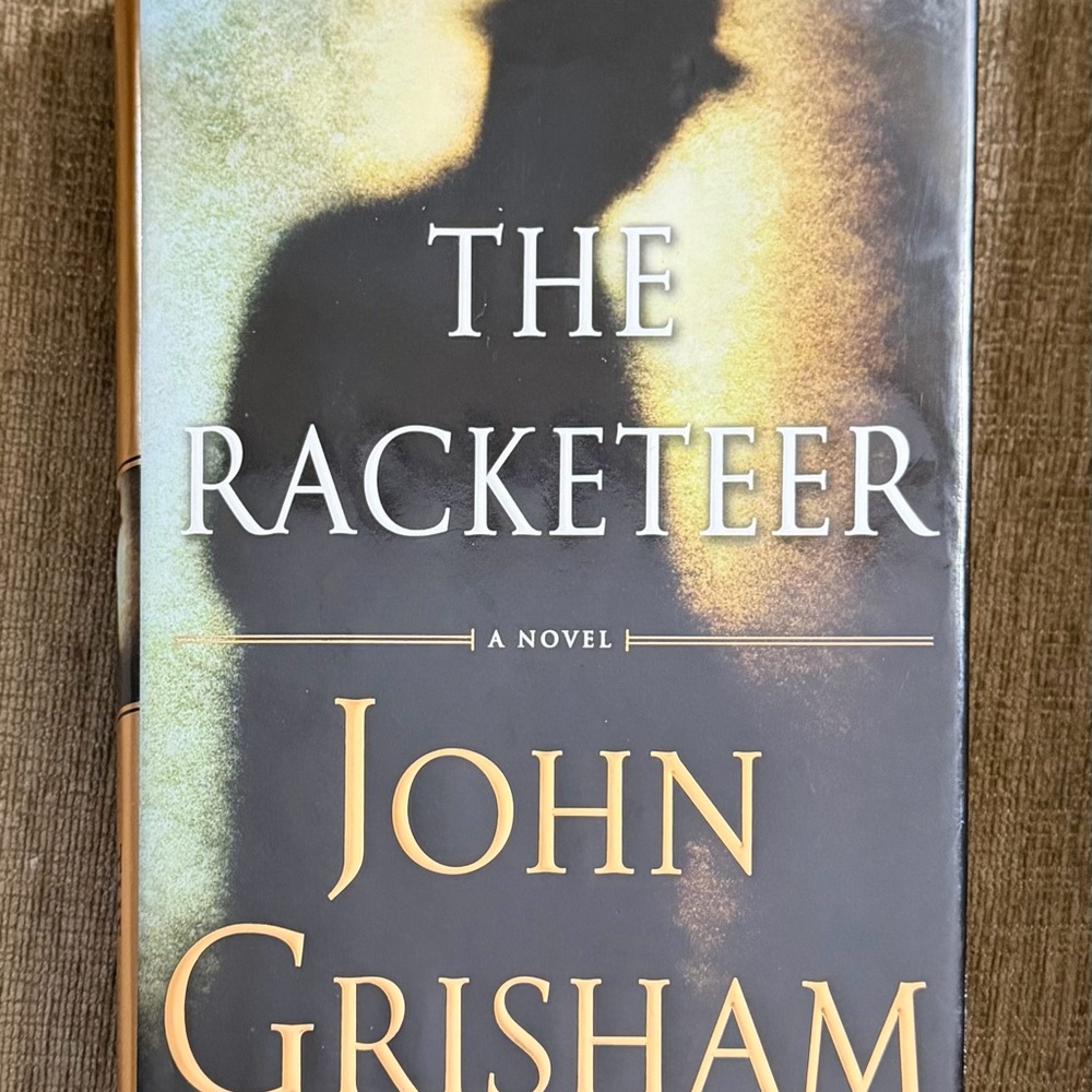 The Racketeer by John Grisham - Black & Gold Hardcover